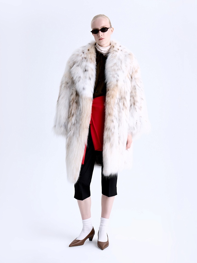 Шуба из меха рыси с итальянским дизайном
